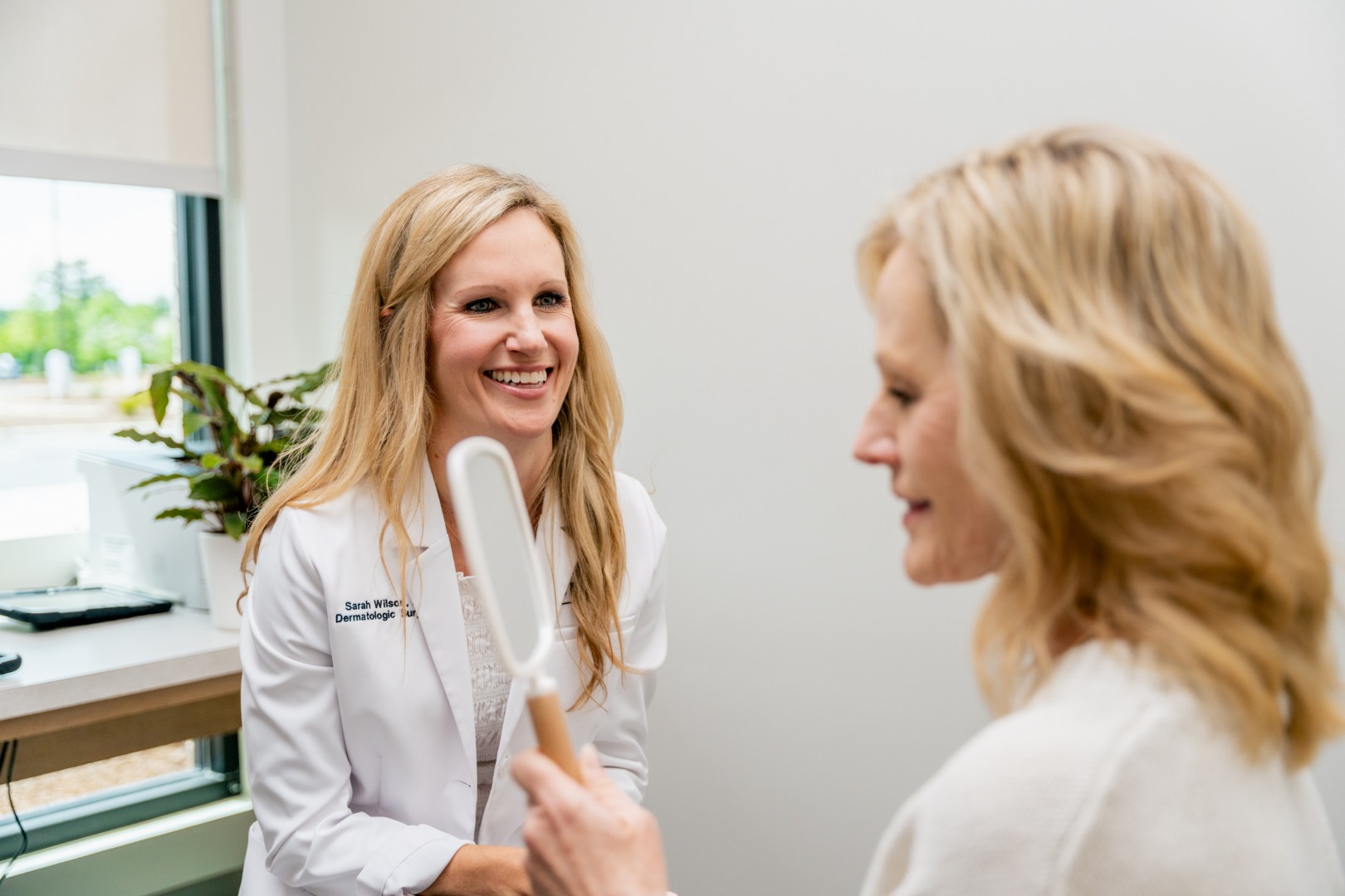 Patient consulting with providers about filler
